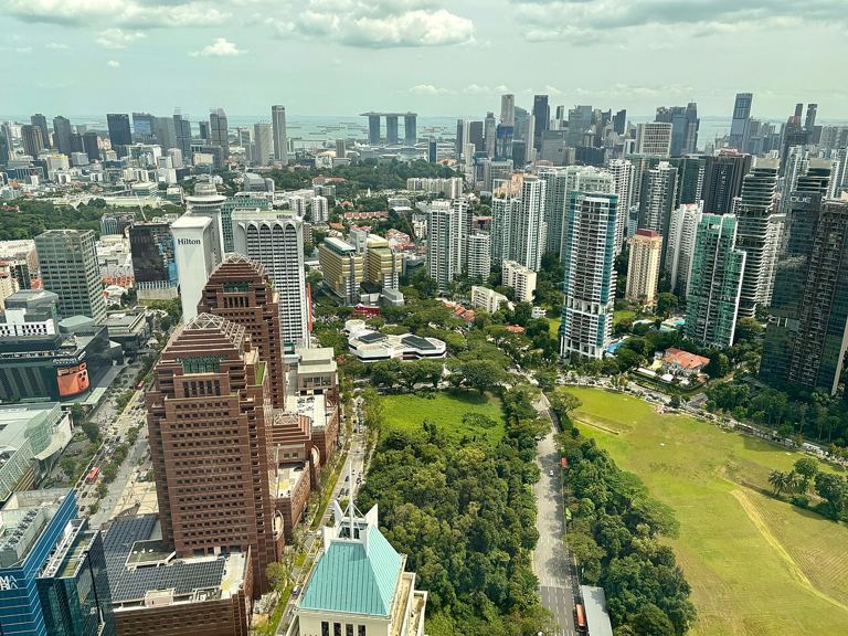 View over Orchard Road condominiums and the Istana grounds towards Marina Bay, Singapore, January 2026